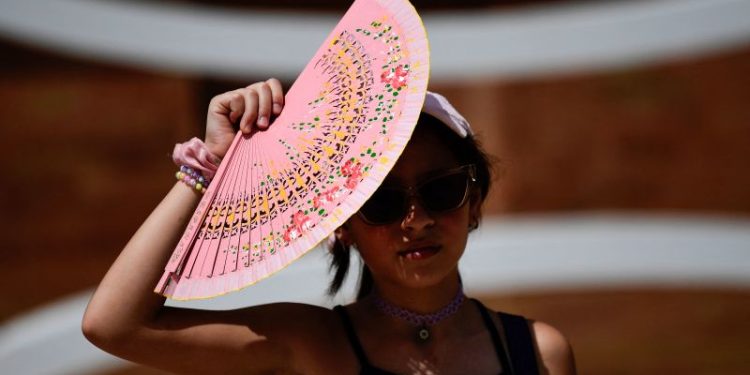 Severe heat waves hit southern Europe as local authorities warn against wildfire risks