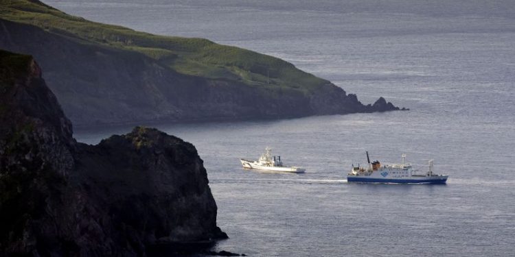 Japan braces for more quakes, authorities dismiss doomsday hype