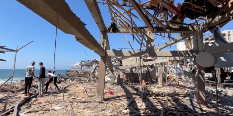 Israeli strike on cafe near Gaza City port kills dozens, hospital official says